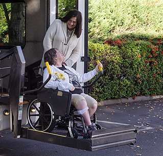 Woman with Disability on Vehicle Lift Woman with Disability on Vehicle Lift
